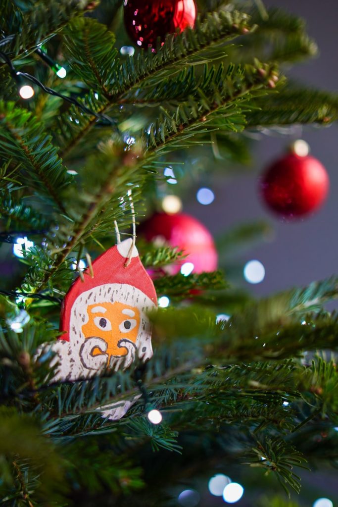 A close up of a christmas tree with ornaments